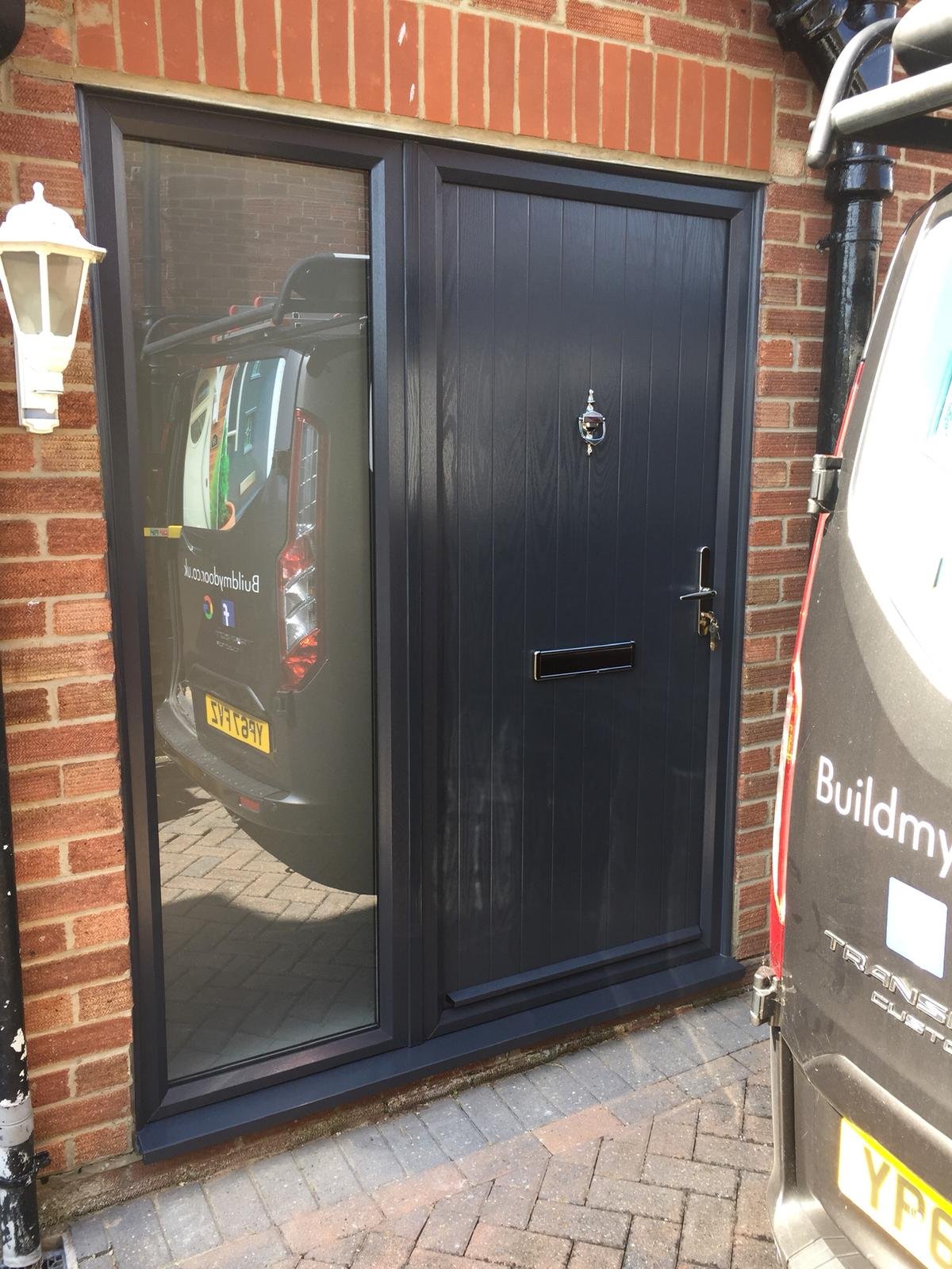 solid grey composite door with side panel